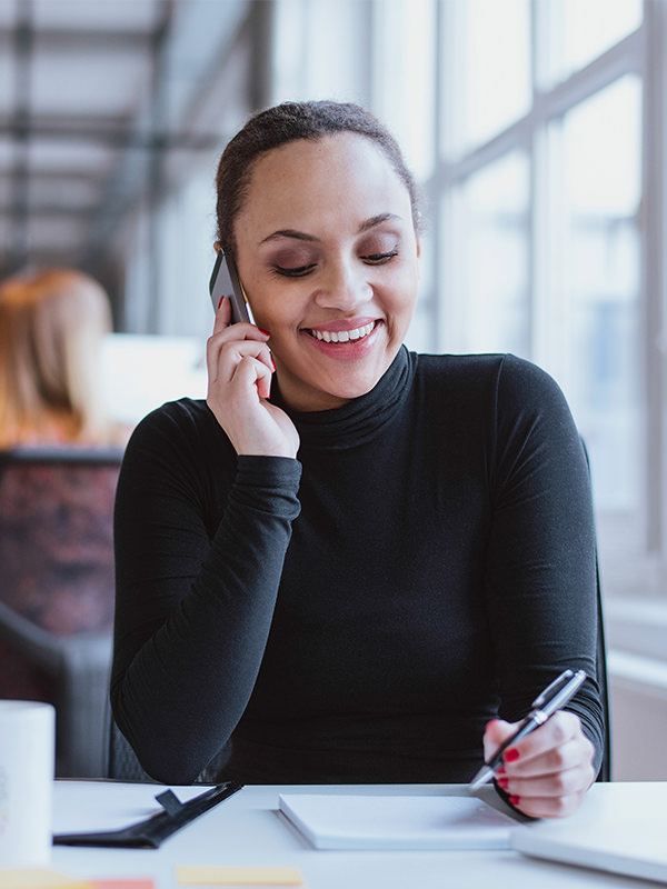 Woman Smiling on Phone