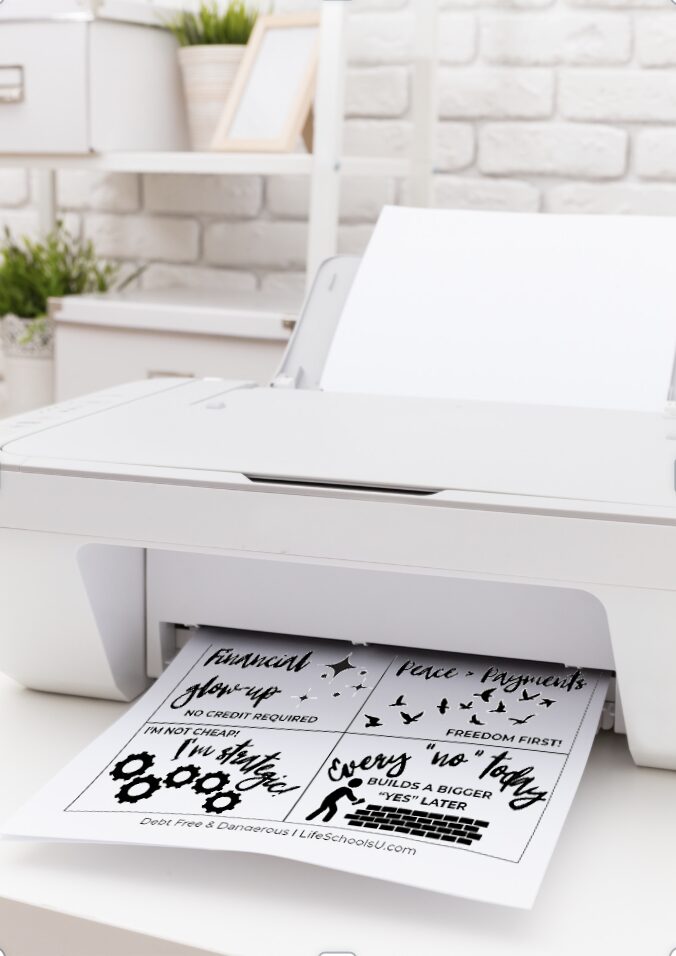 Home-printed Sanctified Sass cards stacked beside a printer and scissors.